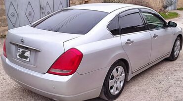 Nissan Teana: 3.2 l | 2004 il Sedan