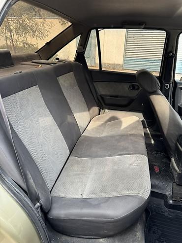 tiger auto: Daewoo Nexia: 2011 г., Механика, Бензин, Седан — 7