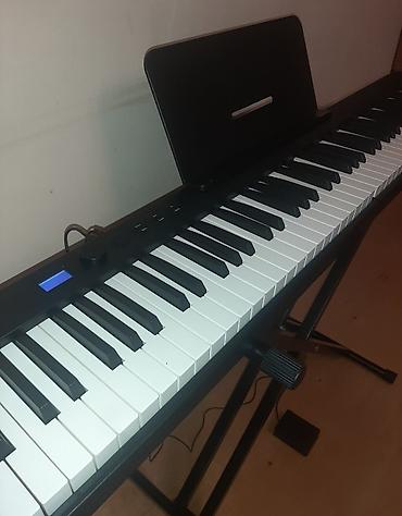 Musiqi alətləri: Rəqəmsal qatlanabilən piano – 88 klavişli, tam ölçülü klaviatura — 2