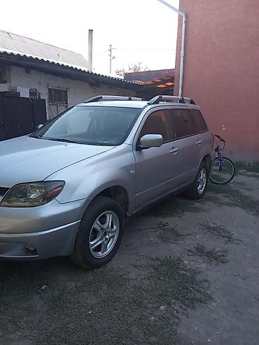 audi с 4: Mitsubishi Outlander: 2003 г., 2 л, Механика, Бензин, Кроссовер — 3