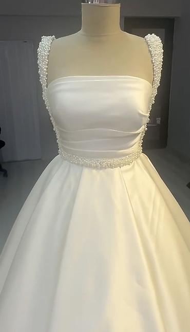 Свадебные платья и аксессуары: Gəlinlik – klassik “ball gown” siluetli, atlas parça. - Rəng: İvori/ — 3