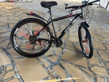 Şəhər velosipedləri: Sport Time dağ velosipedi Xüsusiyyətlər: - Geniş protektorlu, dişli