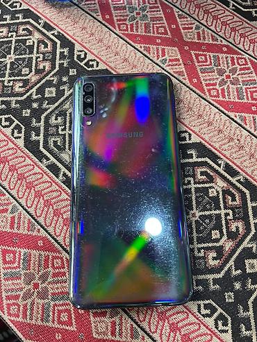 retro telefonlar: Samsung Galaxy A50, rəng - Qara, Barmaq izi — 2