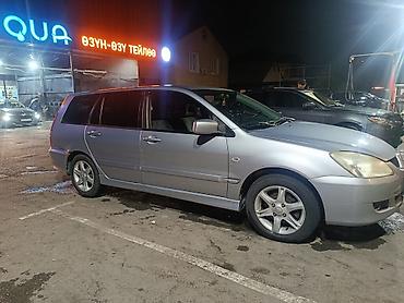 руль мицубиси: Mitsubishi Lancer: 2005 г., 1.6 л, Механика, Бензин, Универсал — 9