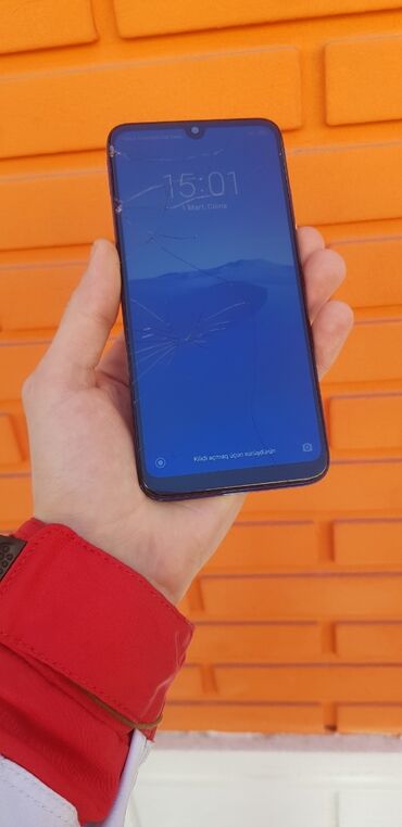 telefo: Xiaomi Redmi 7, 32 ГБ, цвет - Голубой, 
 Сенсорный, Отпечаток пальца, Две SIM карты
