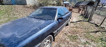 Audi: Audi 100: 1990 г., Седан — 4