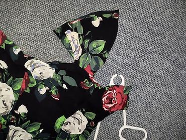 ara torbe: Ženska midi haljina s floralnim printom - Model: kroj u obliku slova — 4
