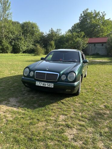 Mercedes-Benz E-Class: 2.3 л | 1996 г. Седан