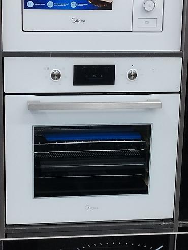 Духовки: Встраиваемый электрический духовой шкаф Midea в белом исполнении — 1