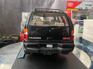 Avtomobil modelləri: Коллекционная модель GMC Yukon Denali black 2001 Welly Art  — 14