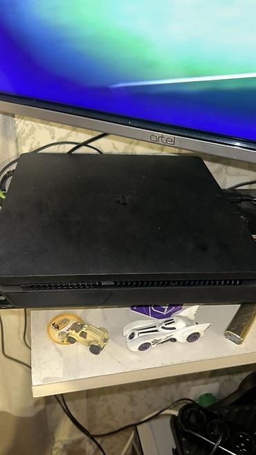 Video oyunlar və konsollar: PlayStation 4 Slim oyun konsolu Xüsusiyyətlər: - Model: PS4 Slim — 1