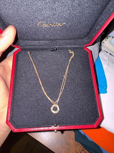kolca: Dəstə daxildir: Boyunbağı, Cartier, Sarı qızıl, 750 Əyar, 3 g — 1
