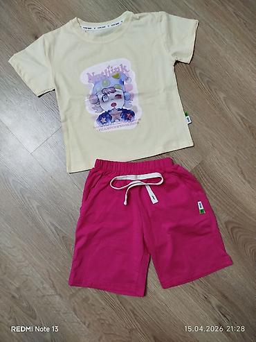 Dəstlər: Uşaq geyim dəstləri 1) Krem rəngli 2 hissəli dəst: - Qolsuz jilet — 4