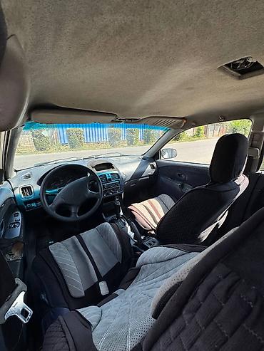 на 124: Mitsubishi Carisma: 2000 г., 1.9 л, Автомат, Бензин, Седан — 6