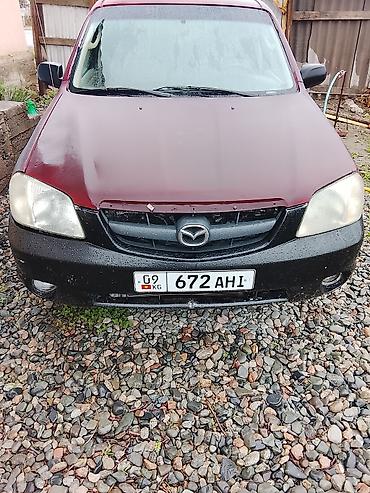 тиков: Mazda Tribute: 2003 г., 3 л, Автомат, Бензин, Кроссовер — 3
