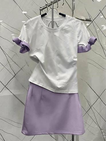 Kompleti: Damski komplet – kratka majica i mini suknja Opis: - Elegantni letnji — 9