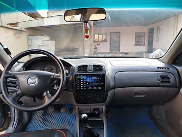 Mazda: Mazda 323: 2002 г., 1.6 л, Механика, Бензин, Универсал at lalafo.kg — 6 Mazda: Mazda 323: 2002 г., 1.6 л, Механика, Бензин, Универсал — 6