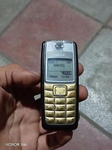 gsm repeater: Nokia 64 GB, rəng - Qızılı, Düyməli — 1