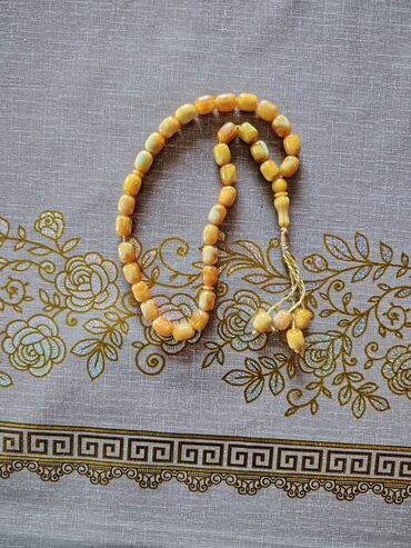 Eynəklər: Kehraba tesbeh