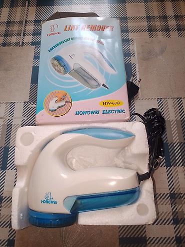 əl utusu: Məhsul: Hongwei Electric Lint Remover (HW-678) Xüsusiyyətlər: - — 1