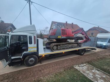 beograd sokobanja prevoz: Usluge prevoza radnih masina Prevoz radnih masina