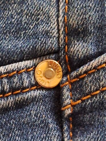 Farmerke: Ženske farmerice od tamno-plavog teksasa sa ravnim krojem i srednjim na lalafo.rs — 7 Farmerke: Ženske farmerice od tamno-plavog teksasa sa ravnim krojem i srednjim — 7