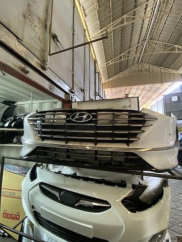 Передний бампер в сборе для Hyundai (с фирменной решеткой радиатора и