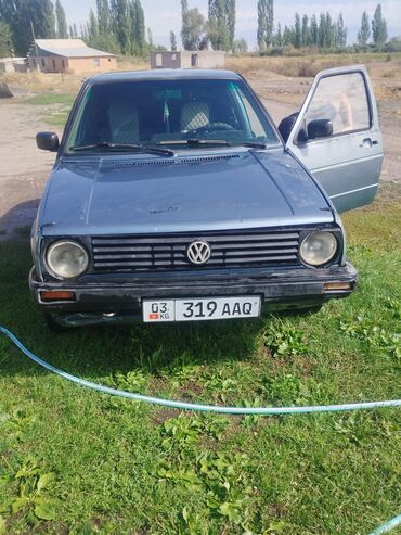 шины бу бишкек оптом: Представлен хэтчбек Volkswagen Golf III синего цвета. Автомобиль имеет