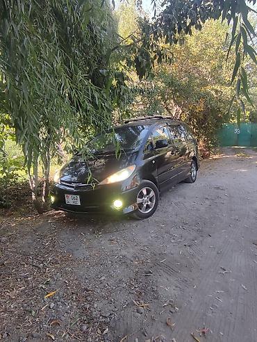 Минивэн Toyota Estima (правый руль), цвет чёрный, на легкосплавных