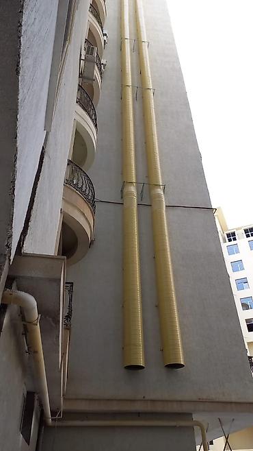 generator təmiri: Bina fasadında sənaye tipli havalandırma/çəkiş kanalları və — 4
