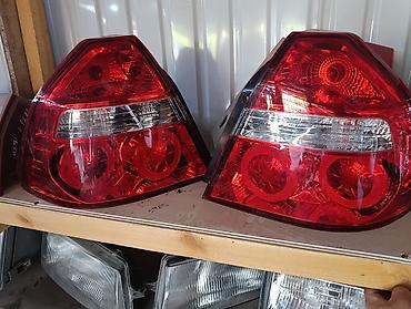 кочкор авто: Задние фонари (левый и правый) для автомобиля Daewoo Nexia 3 — 1