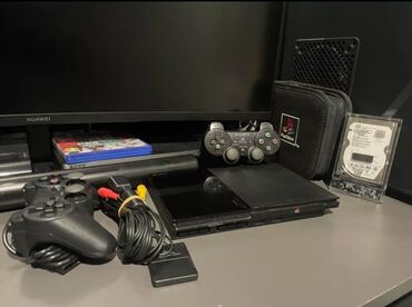 pleşteşin: Playstation 2 (500GB) ideal vəziyyətdə, ən son reviziya cihazdır