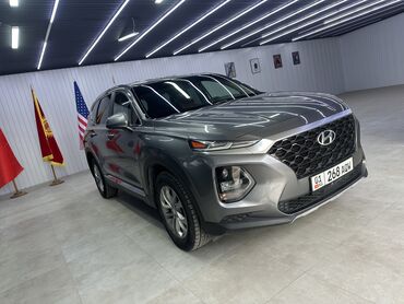 додж дюранго: Стильный внедорожник Hyundai Santa Fe серого цвета, оснащенный