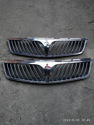 124 решетка: Решетка радиатора Mitsubishi Б/у, Оригинал — 1