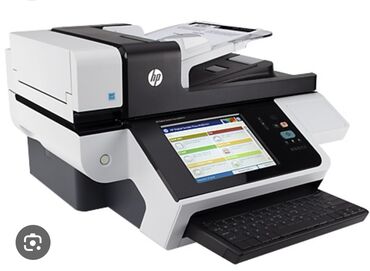 Сканеры: Многофункциональный принтер HP в корпусе белого и черного цвета