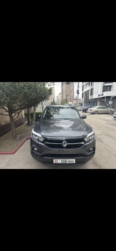 на грузовое авто: SsangYong Rexton – это стильный и практичный пикап серого цвета