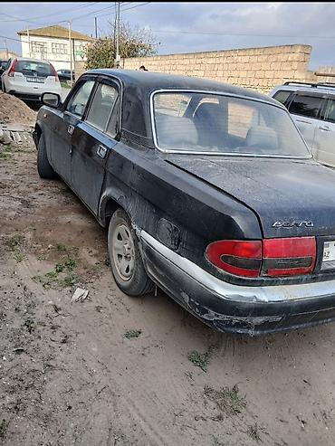 07 kardan: GAZ Volga 3110, sedan, qara rəng. evala salam xırda prablemleri var — 3