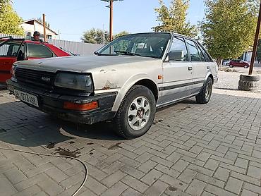 авто ярис: Nissan Bluebird: 1989 г., Механика, Хэтчбэк — 3