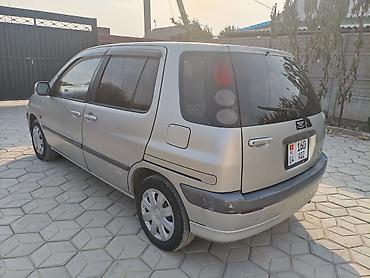 таета 30: Toyota Raum: 2000 г., 1.5 л, Автомат, Бензин, Минивэн — 4
