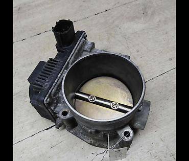 elektron moto: Zaslonka, Elektron qaz klapanı (throttle body) Nissan murano 3.5 dən — 1