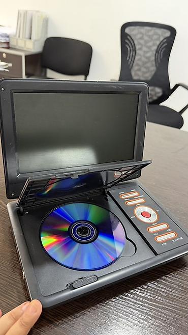 куплю dvd: Портативный DVD/EVD-проигрыватель BEKO с поворотным экраном - Экран — 1
