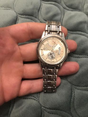 daniel wellington saat: Kişi qol saatı – metal korpus və paslanmayan poladdan metal qayış — 1