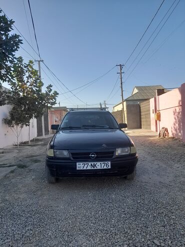 Opel: Model: Opel Astra F Caravan (universal kuzov) Rəng: qara Dövlət nömrə — 11