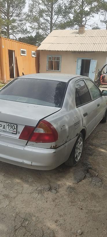 Mitsubishi Lancer: 1999 г., Механика, Седан