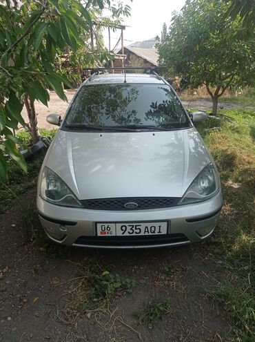 радиатор кондиционера опель зафира а: Универсал Ford Focus первого поколения, выполненный в серебристом