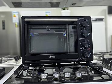 Компактная электрическая мини-печь Midea с механическим управлением at lalafo.kg Компактная электрическая мини-печь Midea с механическим управлением
