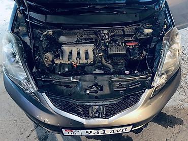 кю 7: Honda Fit: 2009 г., 1.5 л, Автомат, Бензин, Хэтчбэк — 7