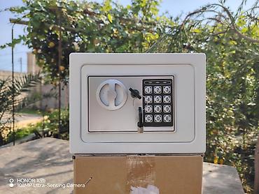 seyfler: Elektron kodlu mini seyf - Rəng: ağ - Material: polad gövdə, metal — 1
