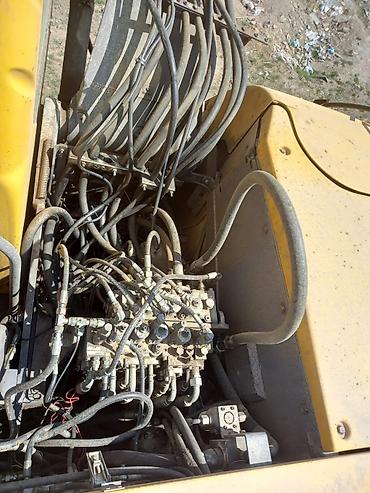 Экскаваторы: Экскаватор, 2006 г., Колесный — 12