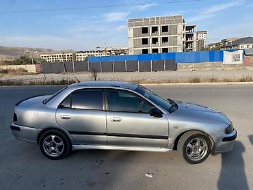 forester 2004: Mitsubishi Carisma: 2002 г., 1.6 л, Автомат, Бензин, Седан — 4